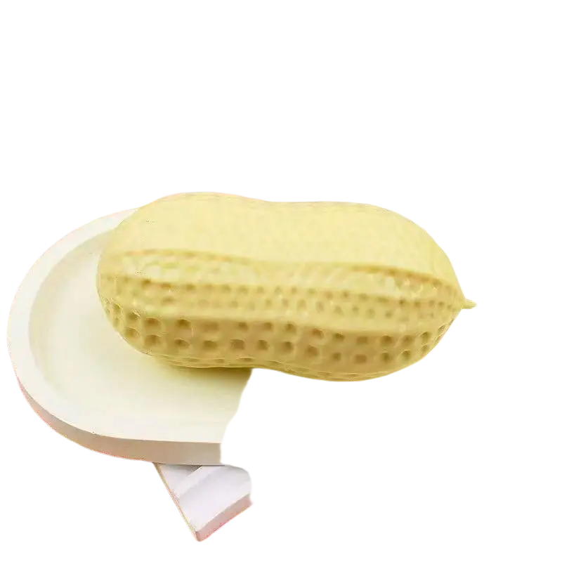 Yellow peanut stress relief squishy toy shaped soap bar with pale yellow color and textured surface with indentations