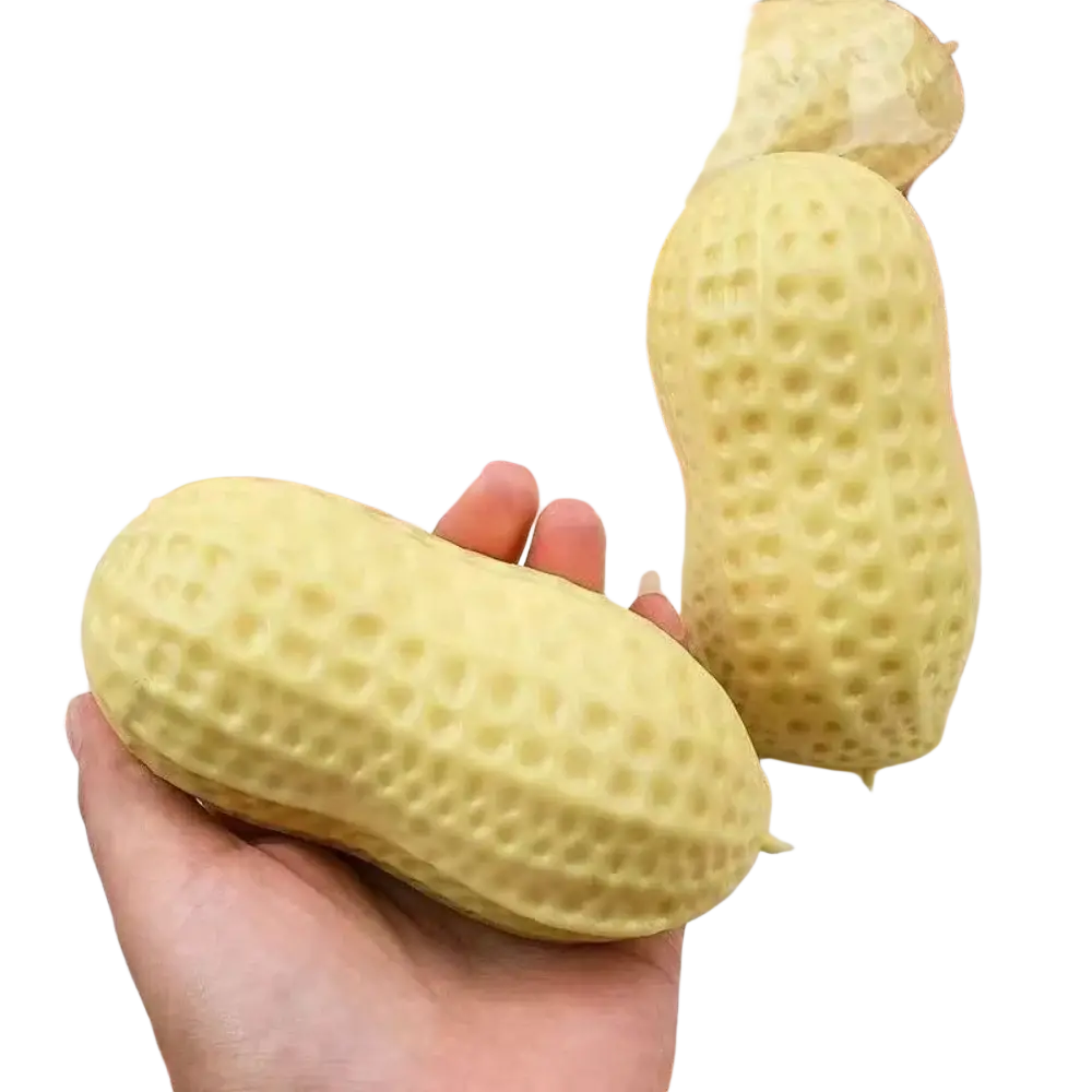 Yellow peanut stress relief squishy toy with textured surface designed as a soft silicone stress ball
