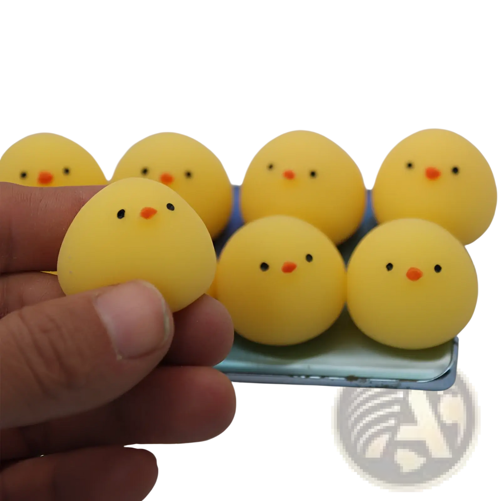 Yellow rubber chicken stress ball made of soft material designed as a squeezing toy for stress relief
