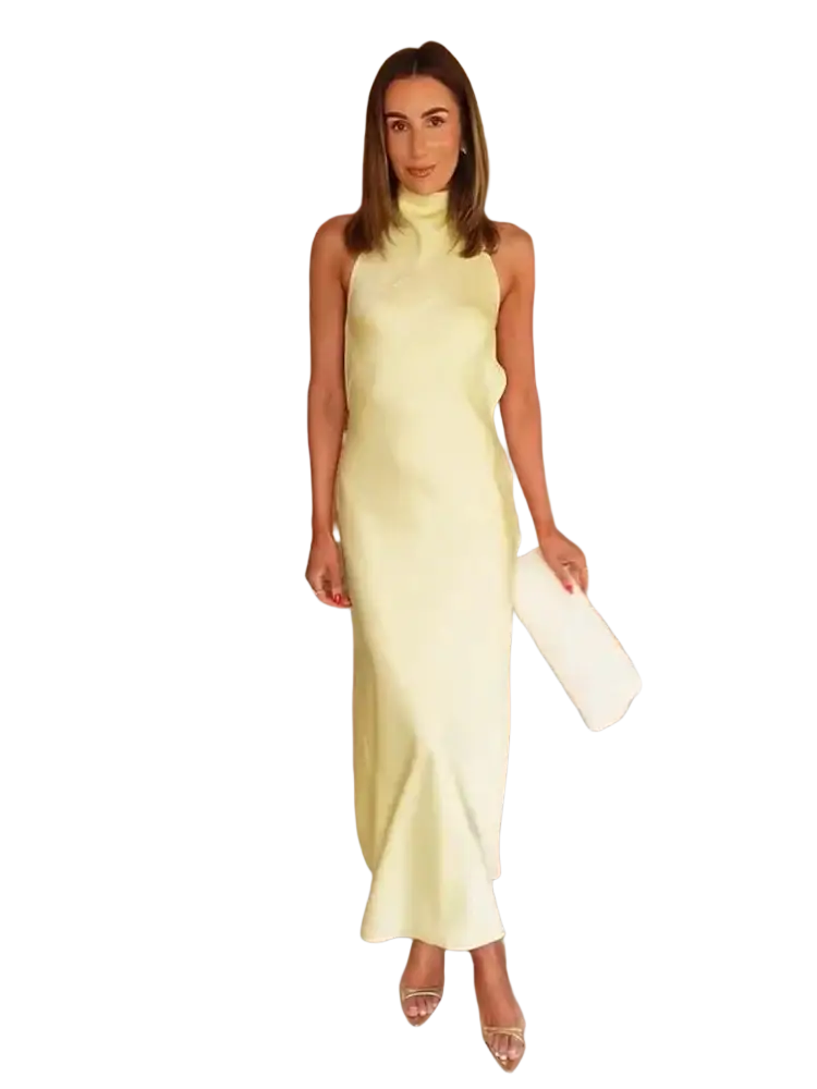 A sleek pale yellow satin halter evening maxi dress with a sleeveless high neckline and flowing silhouette