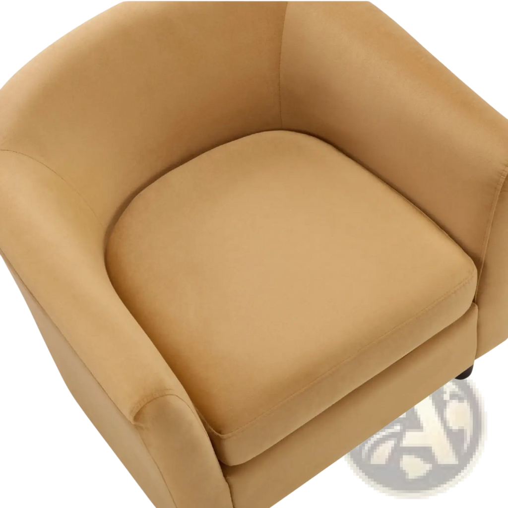 Tan leather bucket chair with rounded arms and cushioned seat complementing yellow velvet barrel chair and ottoman set