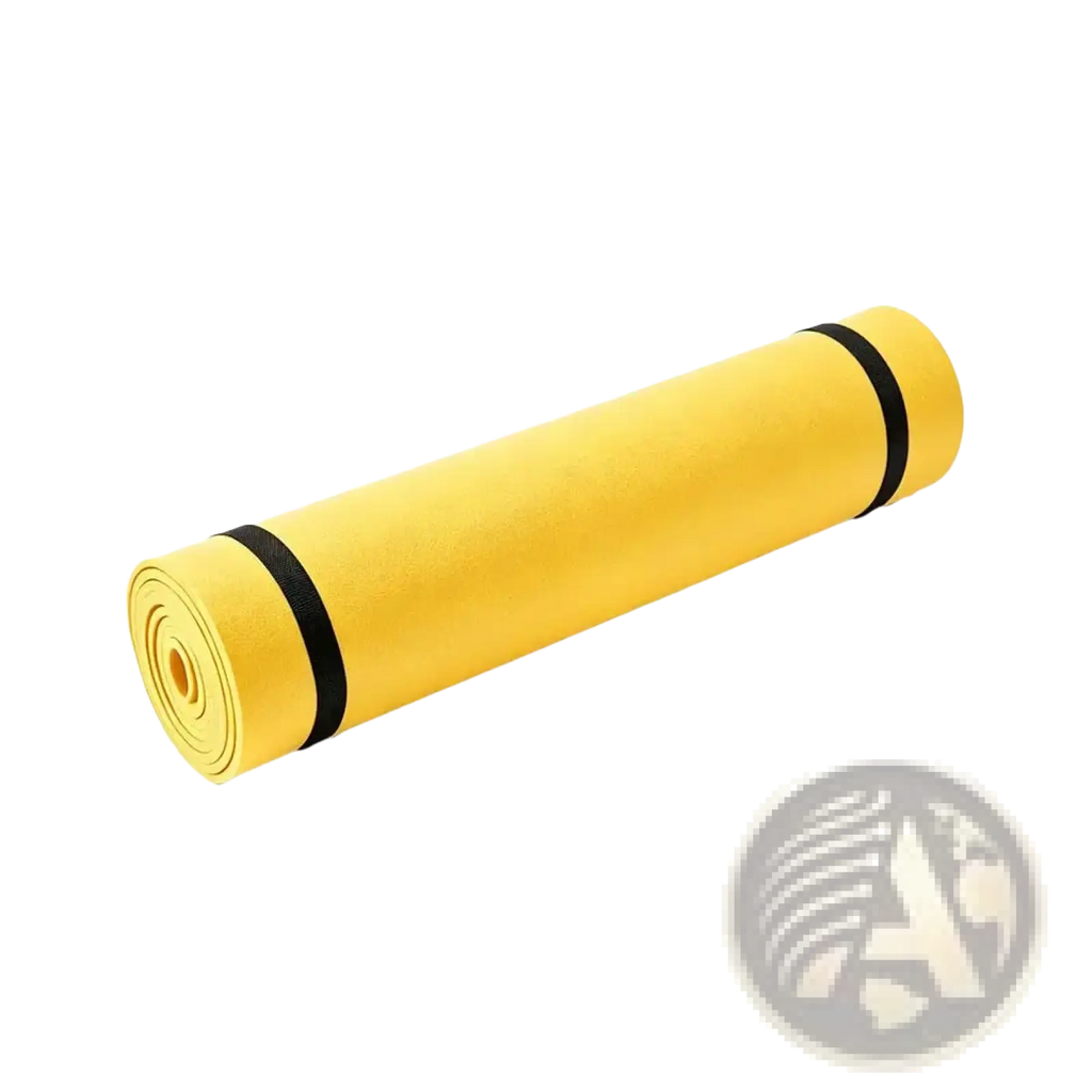 Bright yellow non slip thick yoga mat rolled and secured with black straps for portable exercise use