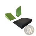 Yoga wedge block made of green and black foam with precise dimensional markings for stretching and squats