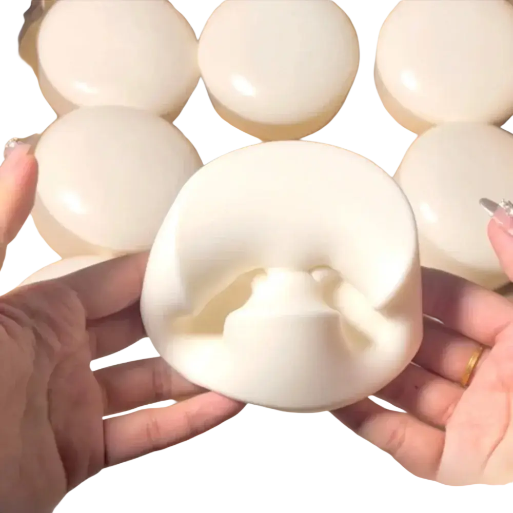 White silicone yogurt cake stress relief squishy toy mold shaped like a donut with a central hole