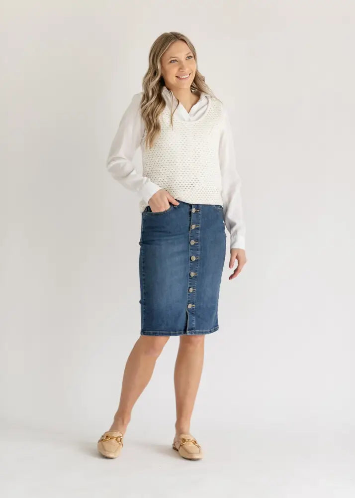 Zana front button denim midi skirt in blue with kick pleat side pockets made from durable denim fabric