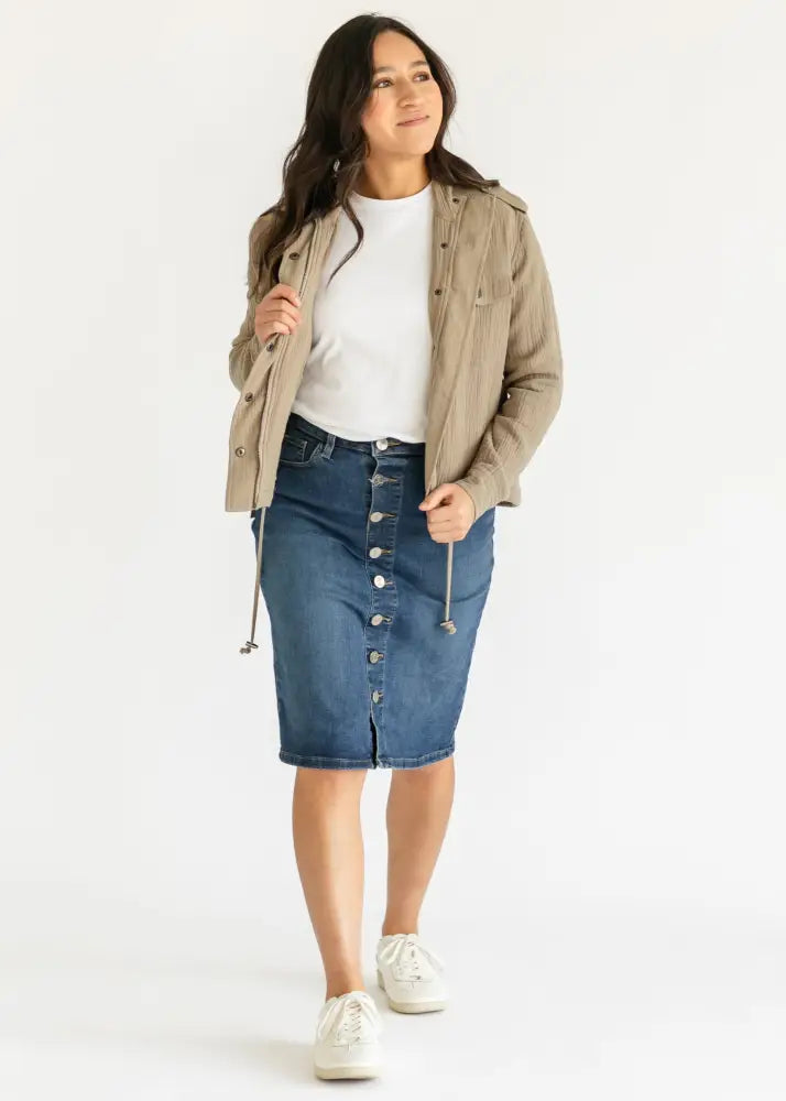 Blue denim midi skirt with front button closure drawstring waistband and kick pleat by Zana