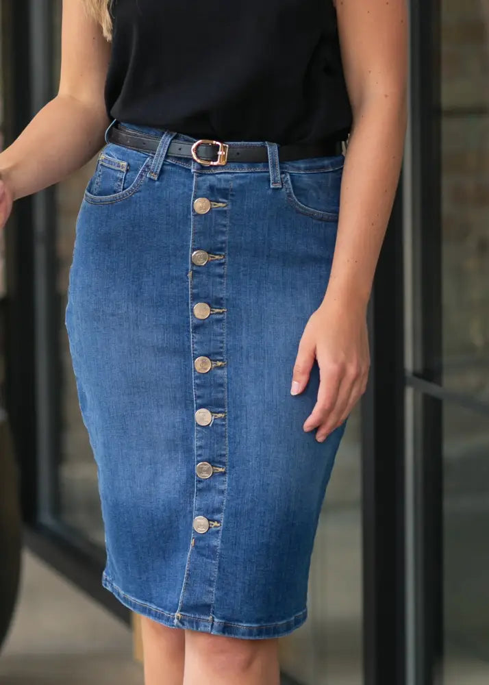 Mid-rise denim pencil skirt with gold-toned front button closure and kick pleat in blue denim fabric