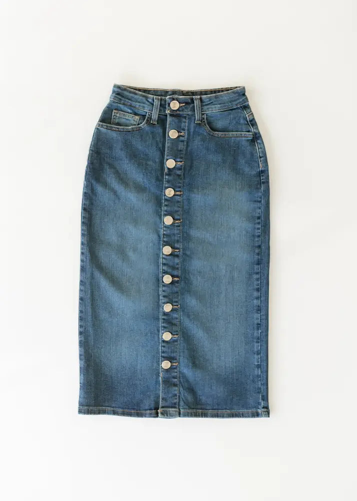 Zana front button denim midi skirt in blue with mid-thigh length, button-front closure, and classic front pockets