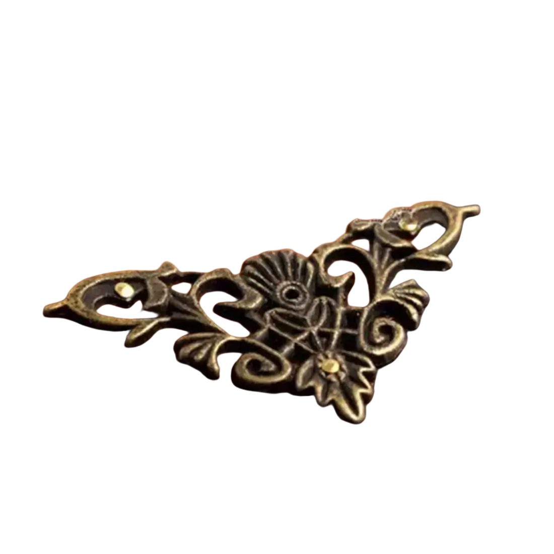 Antique brass floral zinc alloy corner protector on a richly grained wooden box for edge protection