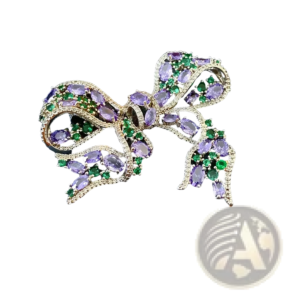 Zircon bow brooch luxury French design silver with oval-cut purple amethysts and emerald green gemstones