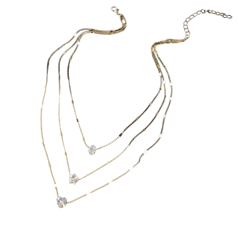 Gold-toned zircon layered pendant necklace for women with three delicate chains and clear crystal pendants of varied shapes
