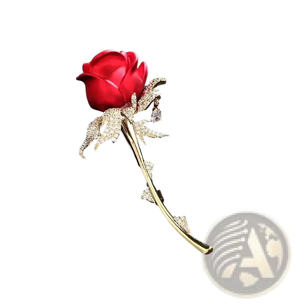 A sparkling red zircon rose brooch with gold-toned stem and clear crystal-adorned leaves