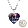 Zodiac celestial heart pendant necklace with silver-toned chain and glossy cosmic-themed charm featuring glowing orb
