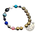 Zodiac volcanic stone beaded bracelet with gold charms featuring turquoise, pink stones, lapis lazuli, and silver star charm