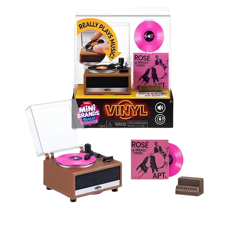 Brown miniature vinyl record player with pink spinning disc and album cover from zuru mini vinyl records blind box toy