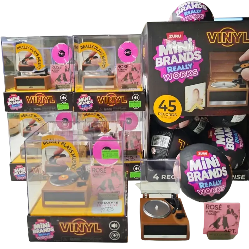 Zuru mini vinyl records blind box toy featuring a mini vinyl record player with wooden base and pink spinning disc